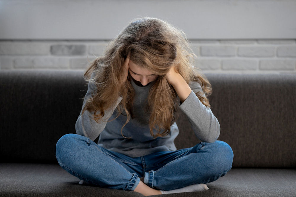 a-woman-journaling-in-the-grass